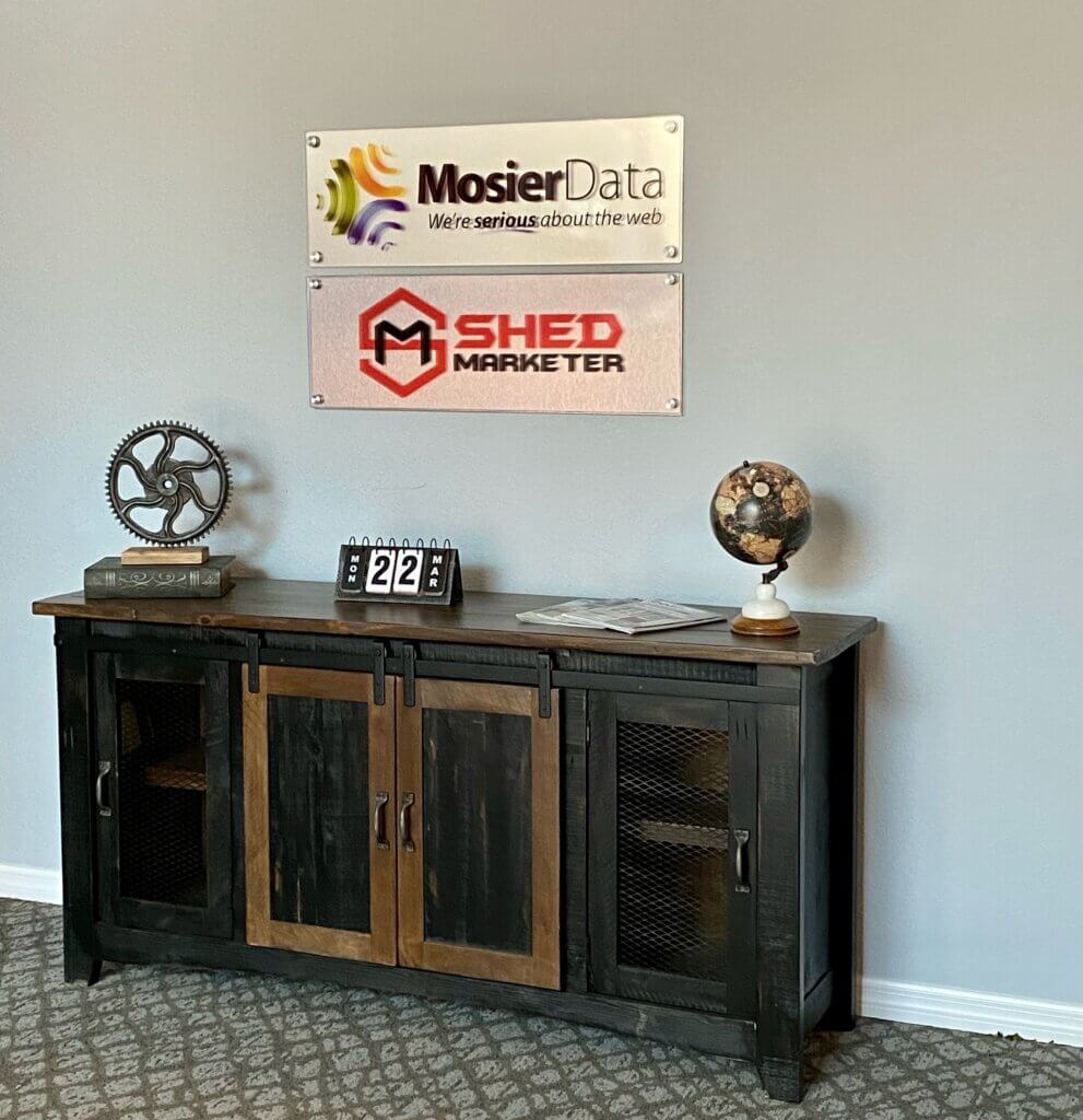 Photo of the sign in the lobby of ShedMarketer